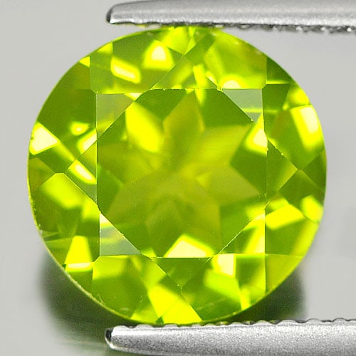 Natural Green Peridot 3.74 Ct. Round Shape 9 Mm. Natural Gemstone From Pakistan: Product ID: 805309679 Product Name: Natural Peridot Weight: 3.74 CT. Size: 9 x 9 x 4.9 MM. Shape: Round Color: Green Clarity:VSI Luster: Good Gems Origin: Pakistan Treatment: Unheated Crystal Structur