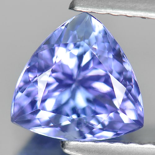 Natural Violetish Blue Tanzanite 1.43 Ct. Clean Trilliant Shape 7.6 x 7.4 Mm Gemstone From Tanzania: Product ID: 807009298 Product Name: Natural Tanzanite Weight: 1.43 CT. Size: 7.6 x 7.4 x 4.4 MM. Shape: Trilliant Color: Blue Clarity:IF Luster: Good Gems Origin: Tanzania Treatment: Heated Crystal St