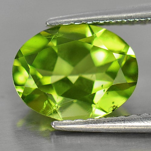 Natural Green Peridot 1.93 Ct. Oval Shape 9 x 7 Mm. Gemstone From Pakistan: Product ID: 805309101 Product Name: Natural Peridot Weight: 1.93 CT. Size: 9 x 7 x 4.3 MM. Shape: Oval Color: Green Clarity:SI1 Luster: Good Gems Origin: Pakistan Treatment: Unheated Crystal Structure