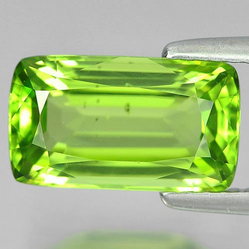Natural Green Peridot 2.96 Ct. VVS Cushion Shape 11.2 x 6.5 Mm. Unheated Gemstone From Pakistan: Product ID: 805305779 Product Name: Natural Peridot Weight: 2.96 CT. Size: 11.2 x 6.5 x 4.4 MM. Shape: Cushion Color: Green Clarity:VVS Luster: Good Gems Origin: Pakistan Treatment: Unheated Crystal S