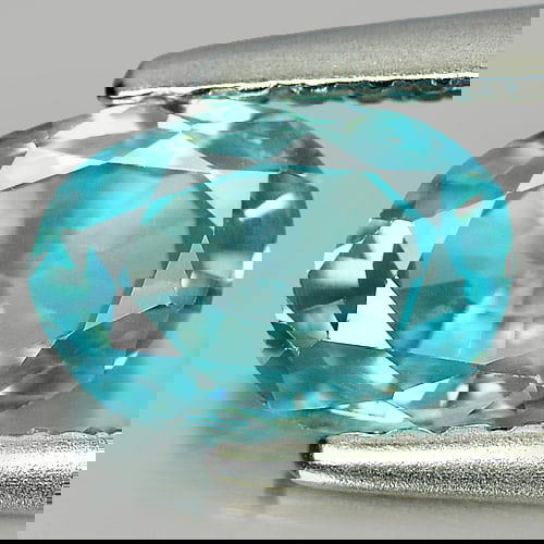 Natural Blue Zircon 0.96 Ct. Oval Shape 6.8 x 4.8 Mm. Gemstone From Cambodia: Product ID: 807714782 Product Name: Natural Zircon Weight: 0.96 CT. Size: 6.8 x 4.8 x 2.8 MM. Shape: Oval Color: Blue Clarity:VVS Luster: Good Gems Origin: Cambodia Treatment: Heated Crystal Structure