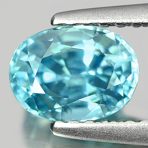 Natural Blue Zircon 1.47 Ct. Oval Shape 6.9 x 5.2 Mm. Gemstone From Cambodia: Product ID: 807711145 Product Name: Natural Zircon Weight: 1.47 CT. Size: 6.9 x 5.2 x 4.1 MM. Shape: Oval Color: Blue Clarity:VSI Luster: Good Gems Origin: Cambodia Treatment: Heated Crystal Structure