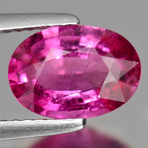Certified Natural Purplish Pink Tourmaline 1.61 Ct. Oval Shape 9.62 x 6.75 Mm. Gemstone From Nigeria: Product ID: 805800272 Product Name: Natural Tourmaline Weight: 1.61 CT. Size: 9.62 x 6.75 x 3.85 MM. Shape: Oval Color: Purplish Pink Clarity:SI Luster: Good Gems Origin: Nigeria Treatment: Unheated C
