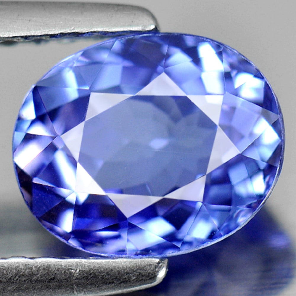 Natural Violetish Blue Tanzanite 1.55 Ct. Oval Shape 8 x 6.5 Mm. Gemstone From Tanzania: Product ID: 807006242 Product Name: Natural Tanzanite Weight: 1.55 CT. Size: 8 x 6.5 x 4 MM. Shape: Oval Color: Violetish Blue Clarity:IF Luster: Good Gems Origin: Tanzania Treatment: Heated Crystal S
