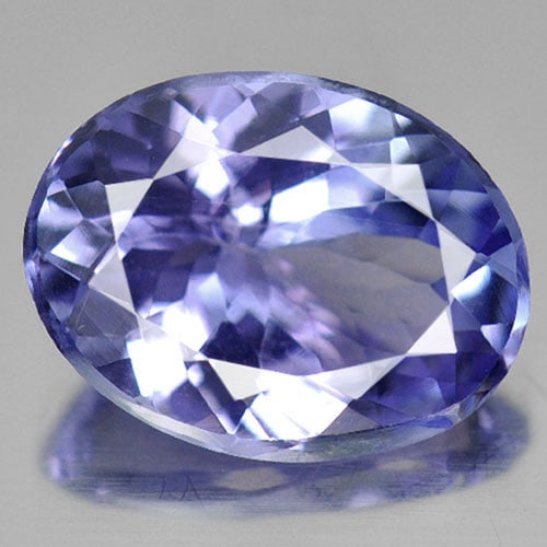 Natural Violetish Blue Tanzanite 1.52 Ct. VVS Oval Shape 8.6 x 6.5 Mm. Gemstone From Tanzania: Product ID: 807009429 Product Name: Natural Tanzanite Weight: 1.71 CT. Size: 9 x 6.9 x 4.2 MM. Shape: Oval Color: Violetish Blue Clarity:VVS Luster: Good Gems Origin: Tanzania Treatment: Heated Crysta