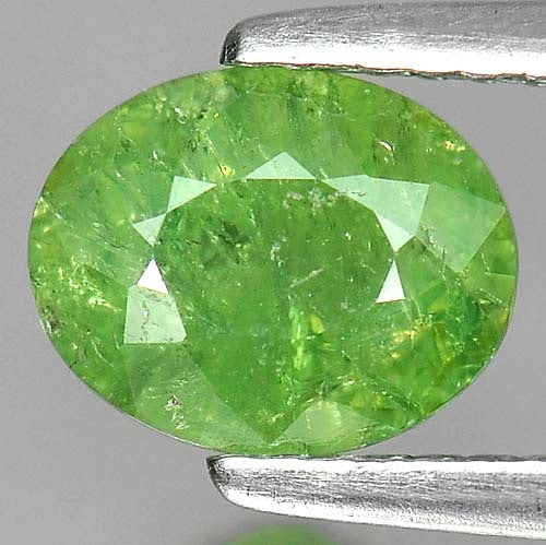 Natural Green Demantoid Garnet 1.75 Ct. Oval Shape 8 x 6.4 Mm. Gemstone From Madagascar: Product ID: 802919308 Product Name: Natural Demantoid Weight: 1.75 CT. Size: 8 x 6.4 x 4.2 MM. Shape: Oval Color: Green Clarity:SI Luster: Good Gems Origin: Madagascar , Africa Treatment: Unheated Cry