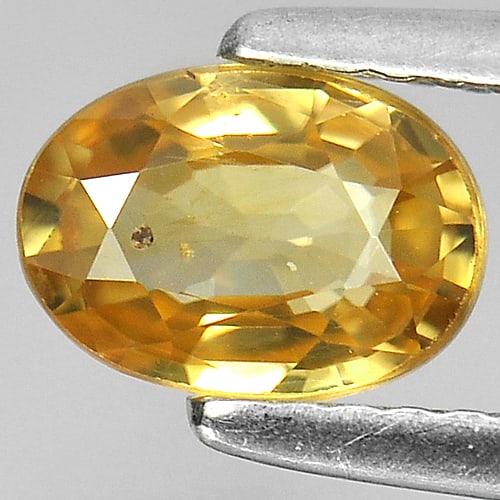 Natural Yellow Color Zircon 1.31 Ct. Oval Shape 7 x 5 Mm. Gemstone From Cambodia: Product ID: 807728785 Product Name: Natural Zircon Weight: 1.31 CT. Size: 7 x 5 x 3 MM. Shape: Oval Color: Yellow Clarity:SI1 Luster: Good Gems Origin: Cambodia Treatment: Heated Crystal Structure: Te