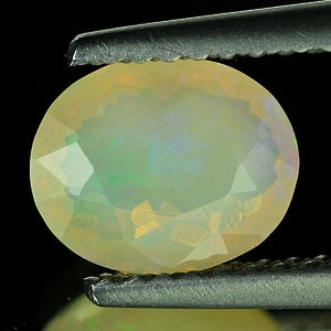 Natural Multi-Color Opal 0.78 Ct. Oval Shape 7.9 x 6.4 Mm. Gemstone From Ethiopia: Product ID: 818715483 Product Name: Natural Opal Weight: 0.78 CT. Size: 7.9 x 6.4 x 3 .8 MM. Shape: Oval Color: Muti Color Clarity:Semi - Transparent Luster: Iridescent Gems Origin: Ethiopia Treatment