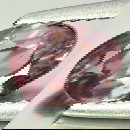 Natural Imperial Pink Zircon 1.41 Ct. Oval Shape 7.4 x 5.4 Mm. Gemstone From Tanzania: Product ID: 807719651 Product Name: Natural Zircon Weight: 1.41 CT. Size: 7.4 x 5.4 x 3.9 MM. Shape: Oval Color: Imperial Pink Clarity:SI Luster: Good Gems Origin: Tanzania Treatment: Unheated Crystal