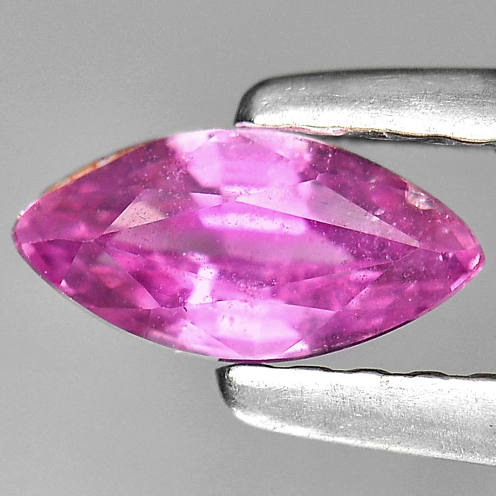 Natural Purplish Pink Sapphire 0.56 Ct. Marquise Shape 6.8 x 3.3 Mm. Gemstone From Tanzania: Product ID: 806119174 Product Name: Natural Pink Sapphire Weight: 0.56 CT. Size: 6.8 x 3.3 x 2.8 MM. Shape: Marquise Color: Purplish Pink Clarity:VSI Luster: Good Gems Origin: Tanzania Treatment: Heat