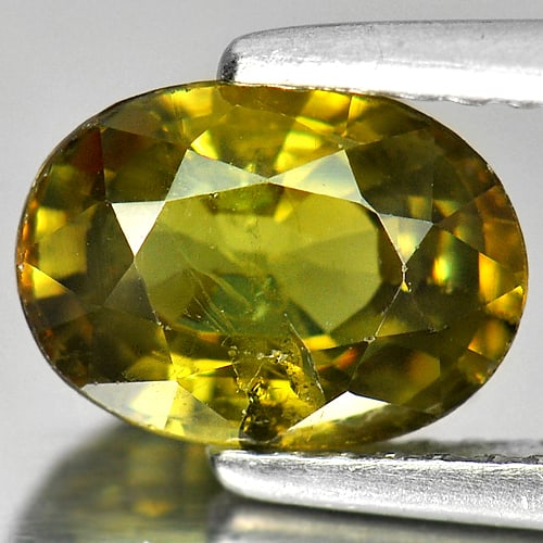Natural Green Demantoid Garnet 2.02 Ct. Oval Shape 8.6 x 6.2 Mm. Gemstone From Madagascar: Product ID: 802925905 Product Name: Natural Demantoid Weight: 2.02 CT. Size: 8.6 x 6.2 x 4.3 MM. Shape: Oval Color: Green Clarity:SI Luster: Good Gems Origin: Madagascar Treatment: Unheated Crystal St