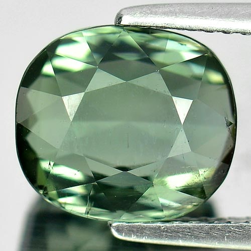 Natural Green Tourmaline 4.69 Ct. Cushion Shape 10.2 x 9.1 Mm. Gemstone Unheated From Nigeria: Product ID: 807234267 Product Name: Natural Tourmaline Weight: 4.69 CT. Size: 10.2 x 9.1 x 6 MM. Shape: Cushion Color: Green Clarity:VSI Luster: Good Gems Origin: Nigeria Treatment: Unheated Crystal S