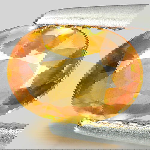 Natural Orangish Yellow Zircon 1.02 Ct. Oval Shape 7 x 5.2 Mm. Gemstone From Cambodia: Product ID: 807727165 Product Name: Natural Zircon Weight: 1.02 CT. Size: 7 x 5.2 x 2.5 MM. Shape: Oval Color: Orangish Yellow Clarity:VSI Luster: Good Gems Origin: Cambodia Treatment: Heated Crystal