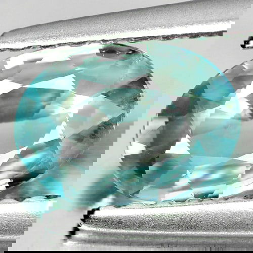 Natural Blue Zircon 0.92 Ct. VVS Oval Shape 7.1 x 5.2 Mm. Gemstone From Cambodia: Product ID: 807715350 Product Name: Natural Zircon Weight: 0.92 CT. Size: 7.1 x 5.2 x 2.4 MM. Shape: Oval Color: Blue Clarity:VVS Luster: Good Gems Origin: Cambodia Treatment: Heated Crystal Structure