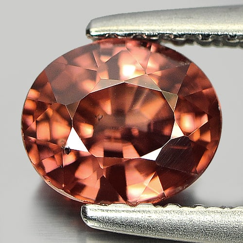Natural Imperial Pink Zircon 1.21 Ct. Oval Shape 6.4 x 5.4 Mm. Gemstone Unheated: Product ID: 807724024 Product Name: Natural Zircon Weight: 1.21 CT. Size: 6.4 x 5.4 x 3.6 MM. Shape: Oval Color: Imperial Pink Clarity:SI Luster: Good Gems Origin: Tanzania Treatment: Unheated Crystal