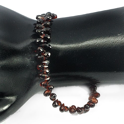 Natural Red Garnet Beads 68.40 Ct. Briolette Shape Unheated Gemstones Length 11 Inch: Product ID: 802918329 Product Name: Natural Garnet Weight: 68.40 CT. Size: 11 Inch / 5.8 x 3.5 x 3.5 MM. Shape: Briolette With Drilled Color: Red Clarity:VVS Luster: Good Gems Origin: Nigeria Treatmen