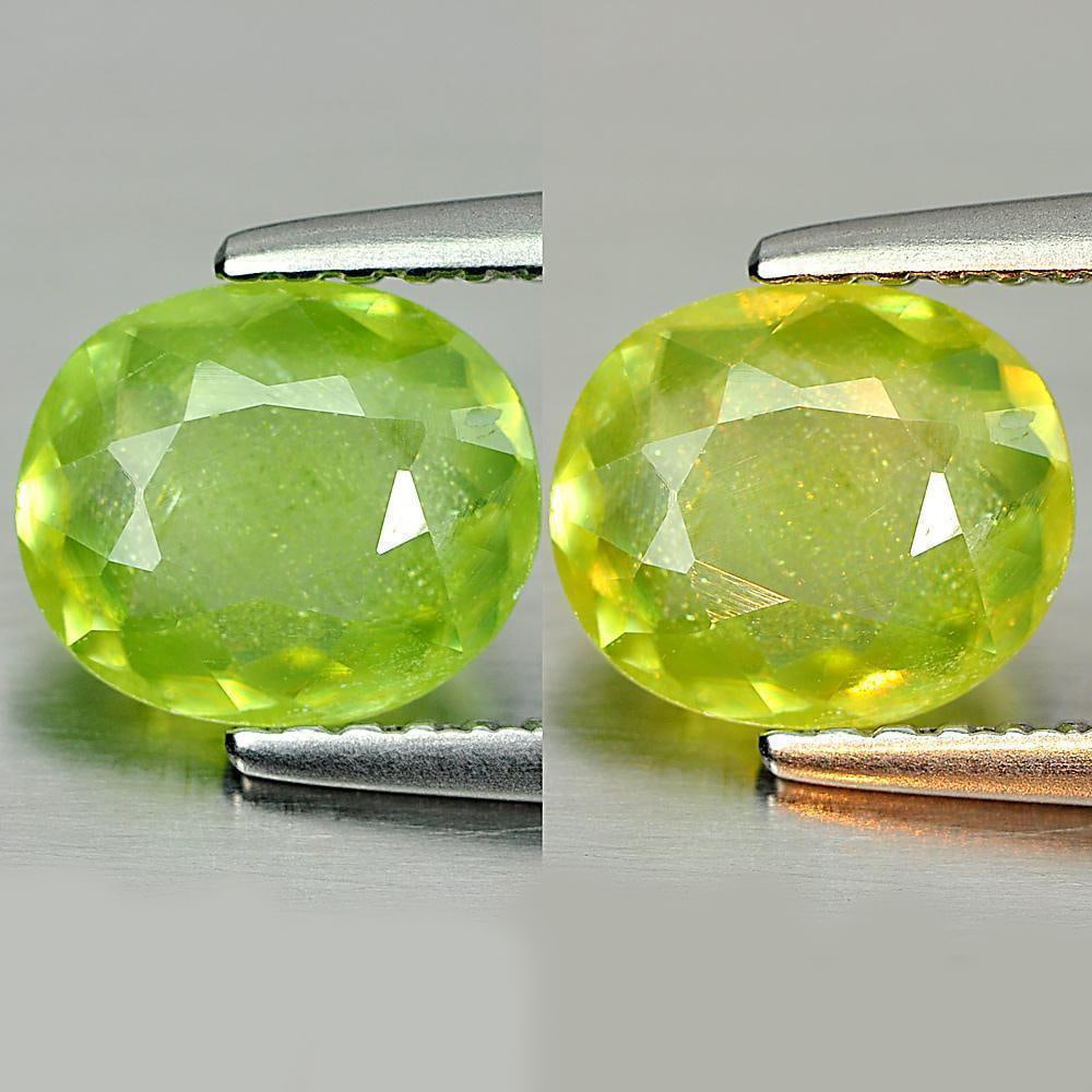 Natural Green Titanium Sphene With Rainbow Spark 1.15 Ct. Oval Shape 7.6 x 6.5 Mm Gemstone: Product ID: 806507896 Product Name: Natural Sphene Weight: 1.15 CT. Size: 7.6 x 6.5 x 2.8 MM. Shape: Oval Color: Green Clarity:SI1 Luster: Good Gems Origin: Madagascar Treatment: Unheated Crystal Stru