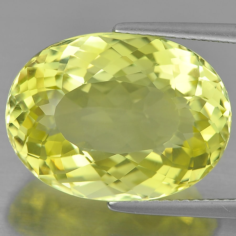 Natural Quartz Yellow Lemon 15.18 Ct. Clean Oval Shape 19 x 14.3 Mm. Unheated Gemstone From Brazil: Product ID: 805528969 Product Name: Natural Quartz Weight: 15.18 CT. Size: 19 x 14.3 x 9.4 MM. Shape: Oval Color: Yellow Clarity:IF Luster: Very Good Gems Origin: Brazil Treatment: Unheated Crystal St