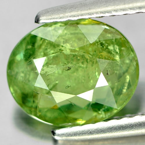 Natural Green Demantoid Garnet 2.17 Ct. Oval Shape 8.8 x 7.3 Mm. Gemstone From Madagascar: Product ID: 802925697 Product Name: Natural Demantoid Weight: 2.17 CT. Size: 8.8 x 7.3 x 3.5 MM. Shape: Oval Color: Green Clarity:SI Luster: Good Gems Origin: Madagascar Treatment: Unheated Crystal St