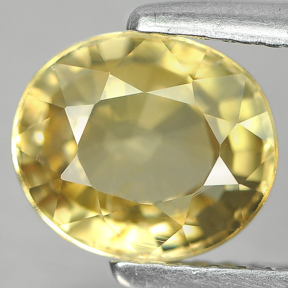 Natural Yellow Zircon 2.76 Ct. VVS Oval Shape 7.9 x 6.8 Mm. Gemstone From Cambodia: Product ID: 807716161 Product Name: Natural Zircon Weight: 2.76 CT. Size: 7.9 x 6.8 x 4.5 MM. Shape: Oval Color: Yellow Clarity:VVS Luster: Good Gems Origin: Cambodia Treatment: Heated Crystal Structu
