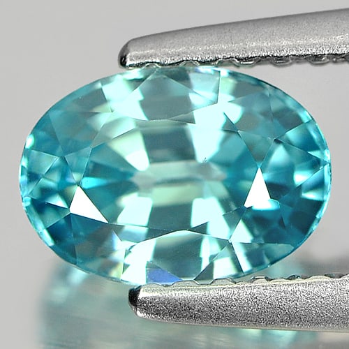 Natural Blue Zircon 1.33 Ct. Oval Shape 6.8 x 5.2 Mm. Gemstone From Cambodia: Product ID: 807714812 Product Name: Natural Zircon Weight: 1.33 CT. Size: 6.8 x 5.2 x 3.5 MM. Shape: Oval Color: Blue Clarity:VSI Luster: Good Gems Origin: Cambodia Treatment: Heated Crystal Structure