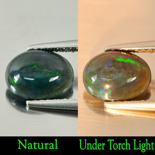 Natural Fire Red Black Opal 0.84 Ct. Oval Cabochon Shape 8.8 x 7 Mm. Gemstone From Ethiopia: Product ID: 818724217 Product Name: Natural Opal Weight: 0.84 CT. Size: 8.8 x 7 x 3 MM. Shape: Oval Cabochon Color: Rainbow Fire Red Black Clarity:Semi - Transparent Luster: Iridescent Gems Origin: Et