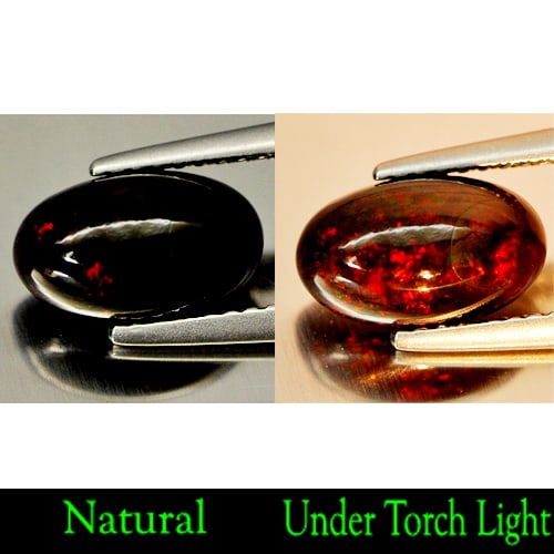 Natural Fire Red Black Opal 1.44 Ct. Oval Cabochon Shape 10.3 x 6.3 Mm. Gemstone: Product ID: 818725519 Product Name: Natural Opal Weight: 1.44 CT. Size: 10.3 x 6.3 x 4.6 MM. Shape: Oval Cabochon Color: Rainbow Fire Red Black Clarity:Opaque Luster: Iridescent Gems Origin: Ethiopia 