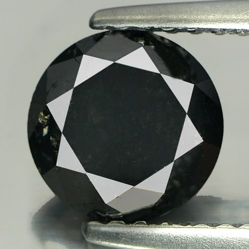 Natural Black Loose Diamond 1.58 Ct. Round Brilliant Cut Size 6.9 Mm. From Belgium: Product ID: 802102313 Product Name: Natural Enhanced Diamond Weight: 1.58 CT. Size: 6.9 x 6.9 x 4.9 MM. Shape: Round Brilliant Cut Color: Black Clarity:Opaque Luster: Good Gems Origin: Belgium Treatme