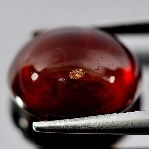 Natural Orangish Red Spessartine Garnet 5.16 Ct. Oval Cabochon Shape 10.9 x 8.9 Mm. Unheated: Product ID: 802934764 Product Name: Natural Spessartine Weight: 5.16 CT. Size: 10.9 x 8.9 x 5.9 MM. Shape: Oval Cabochon Color: Red Clarity:Semi - Transparent Luster: Good Gems Origin: Namibia Treatme
