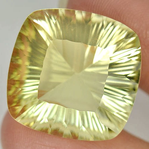 Natural Yellow Lemon Quartz 24.51 Ct. Clean Cushion Concave Cut 10.2 x 10.2 Mm. Gemstone From Brazil: Product ID: 805526344 Product Name: Natural Quartz Weight: 24.51 CT. Size: 10.2 x 10.2 x 11.1 MM. Shape: Cushion Concave Cut Color: Yellow Clarity:IF Luster: Very Good Gems Origin: Brazil Treatment: U
