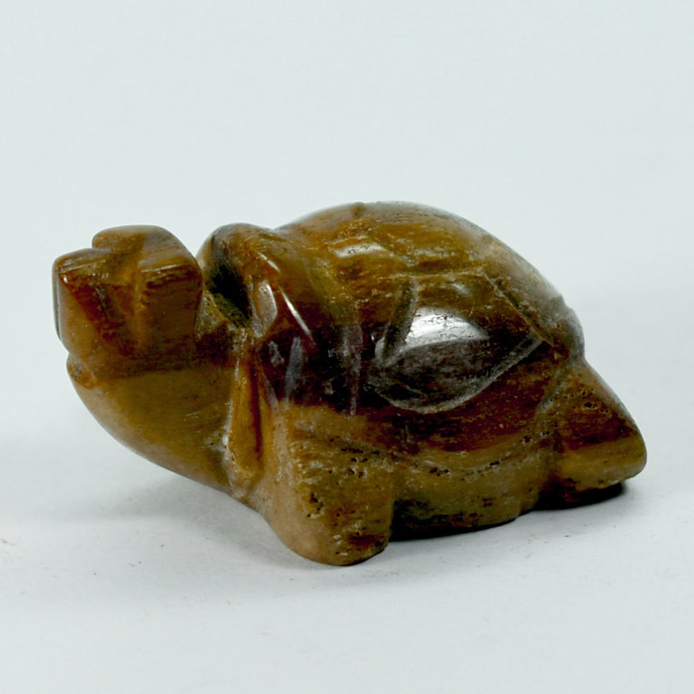 Natural Jade 93.29 Ct. Turtle Carving 25 x 35 x 18 Mm. Gemstone From Burmese: Product ID: 818102408 Product Name: Natural Gemstones Weight: 93.29 CT. Size: 25 x 35 x 18 MM. Shape: Caving Color: multi Color brown Honey Clarity:Opaque Luster: Good Gems Origin: Burma Treatment: Un