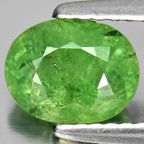 Natural Green Demantoid Garnet 1.58 Ct. Oval Shape 7.5 x 5.9 Mm. Gemstone From Madagascar: Product ID: 802919340 Product Name: Natural Demantoid Weight: 1.58 CT. Size: 7.5 x 5.9 x 4.2 MM. Shape: Oval Color: Green Clarity:SI Luster: Good Gems Origin: Madagascar , Africa Treatment: Unheated C