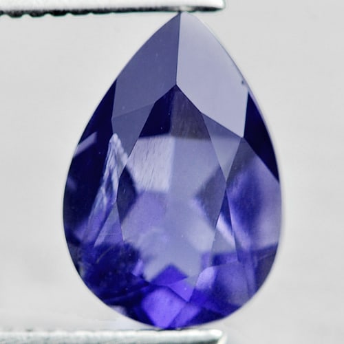 Natural Violet Blue Iolite 1.30 Ct. Pear Shape 9 x 6.4 Mm. Gemstone From Madagascar: Product ID: 803804389 Product Name: Natural Iolite Weight: 1.30 CT. Size: 9 x 6.4 x 4.4 MM. Shape: Pear Color: Violet Blue Clarity:VSI Luster: Good Gems Origin: Madagascar Treatment: Unheated Crystal