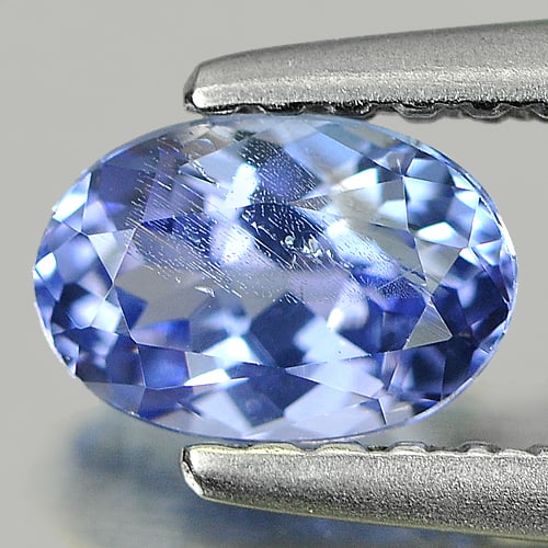 Natural Violetish Blue Tanzanite 0.58 Ct. Oval Shape 6.1 x 4.2 Mm Gemstone From Tanzania: Product ID: 807007010 Product Name: Natural Tanzanite Weight: 0.58 CT. Size: 6.1 x 4.2 x 3.1 MM. Shape: Oval Color: Violetish Blue Clarity:SI Luster: Good Gems Origin: Tanzania Treatment: Heated Cryst
