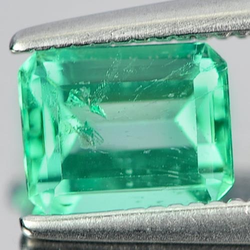 Natural Green Emerald 0.76 Ct. Octagon Shape 6.3 x 5 Mm. Gemstone From Columbia: Product ID: 802402076 Product Name: Natural Emerald Weight: 0.76 CT. Size: 6.3 x 5 x 3.3 MM. Shape: Octagon Color: Green Clarity:SI Luster: Good Gems Origin: Columbia Treatment: Unheated Crystal Struc