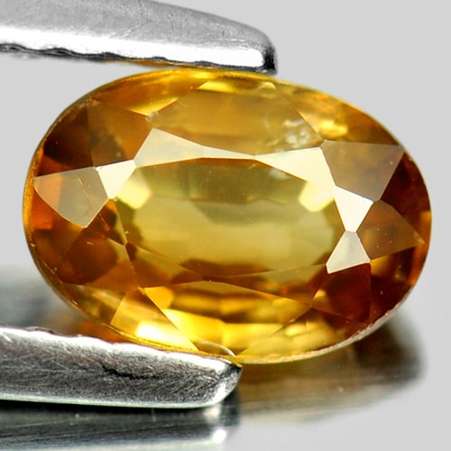 Natural Imperial Zircon 1.22 Ct. Oval Shape 7 x 5 Mm Gemstone From Cambodia: Product ID: 807727250 Product Name: Natural Zircon Weight: 1.22 CT. Size: 7 x 5 x 3 MM. Shape: Oval Color: Imperial Clarity:SI Luster: Good Gems Origin: Cambodia Treatment: Heated Crystal Structure: T