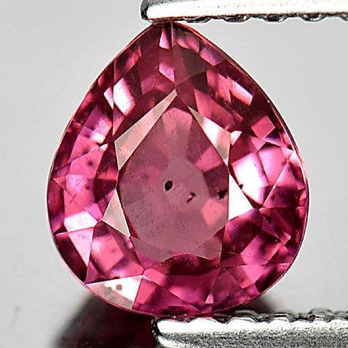 Natural Purplish Pink Malaya Garnet 1.09 Ct. Pear Shape 6.6 x 5.8 Mm. Unheated Gemstone: Product ID: 802934214 Product Name: Natural Malaya Garnet Weight: 1.09 CT. Size: 6.6 x 5.8 x 3.6 MM. Shape: Pear Color: Pink Clarity:VSI Luster: Very Good Gems Origin: Tanzania Treatment: Unheated Cry
