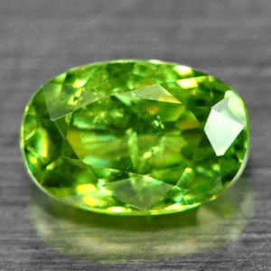 Natural Green Demantoid Garnet 1.12 Ct. Oval Shape 7.5 x 5 Mm. Gemstone From Madagascar: Product ID: 802930172 Product Name: Natural Demantoid Weight: 1.12 CT. Size: 7.5 x 5 x 3.3 MM. Shape: Oval Color: Green Clarity:SI Luster: Good Gems Origin: Madagascar Treatment: Unheated Crystal Stru