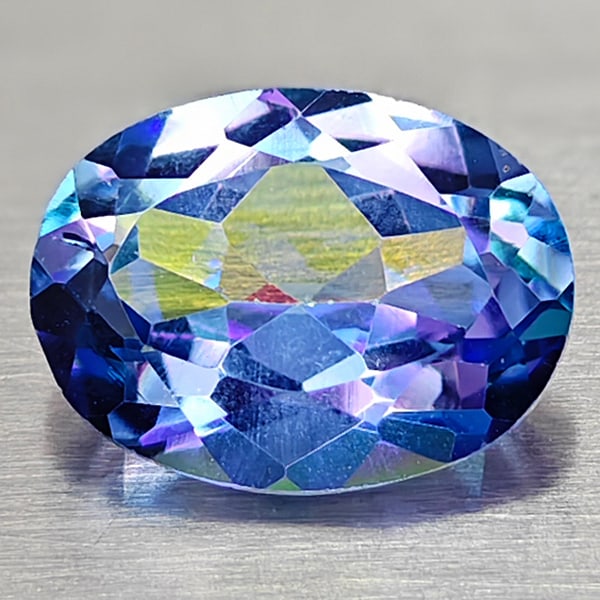 Natural Idiosyncratic Color Topaz 1.40 Ct. Oval Shape 8 x 6.1 Mm Gemstone From Brazil: Product ID: 807167838 Product Name: Natural Topaz Weight: 1.40 CT. Size: 8 x 6.1 x 3.8 MM. Shape: Oval Color: Idiosyncratic Clarity:IF Luster: Very Good Gems Origin: Brazil Treatment: Treated Crystal 