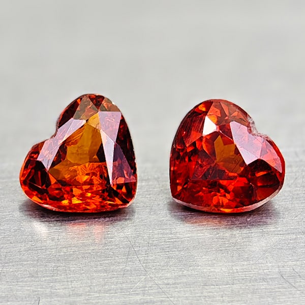 Natural Orange Spessartine Garnet 1.25 Ct. 2 Pcs Heart Shape 5.4 x 4.7 Mm Gemstone From Nigeria: Product ID: 802936418 Product Name: Natural Spessartine Weight: 1.25 CT. Size: 5.4 x 4.7 x 2.7 MM. Shape: Heart Shape Color: Orangish Red Clarity:VSI Luster: Good Gems Origin: Nigeria Treatment: Unhea