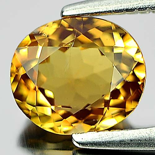 Natural Brownish Yellow Tourmaline 0.93 Ct. Oval Shape 6.7 x 5.8 Mm Gemstone From Nigeria: Product ID: 807248910 Product Name: Natural Tourmaline Weight: 0.93 CT. Size: 6.7 x 5.8 x 3.5 MM. Shape: Oval Color: Brownish Yellow Clarity:VSI Luster: Good Gems Origin: Nigeria Treatment: Unheated C