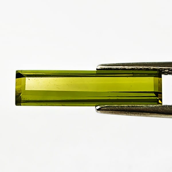 Natural Green Tourmaline 1.62 Ct. Octagon Shape 9.6 x 4.6 Mm Gemstone From Nigeria: Product ID: 807250258 Product Name: Natural Tourmaline Weight: 1.62 CT. Size: 9.6 x 4.6 x 3.6 MM. Shape: Octagon Color: Green Clarity:VSI Luster: Good Gems Origin: Nigeria Treatment: Unheated Crystal 