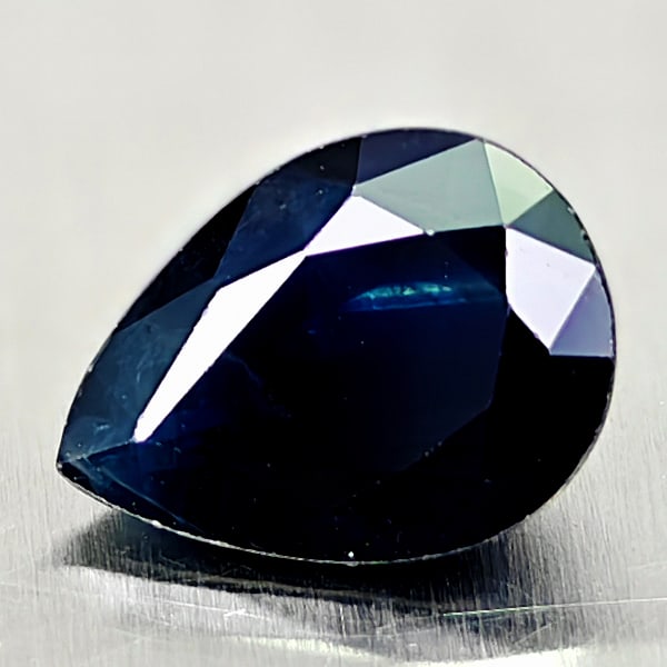 Natural Black Sapphire 1.69 Ct. Pear Shape 8.7 x 6.5 Mm Gemstone From Australia: Product ID: 806161863 Product Name: Natural Black Sapphire Weight: 1.69 CT. Size: 8.7 x 6.5 x 4 MM. Shape: Pear Shape Color: black Clarity:Opaque Luster: Very Good Gems Origin: Australia Treatment: He