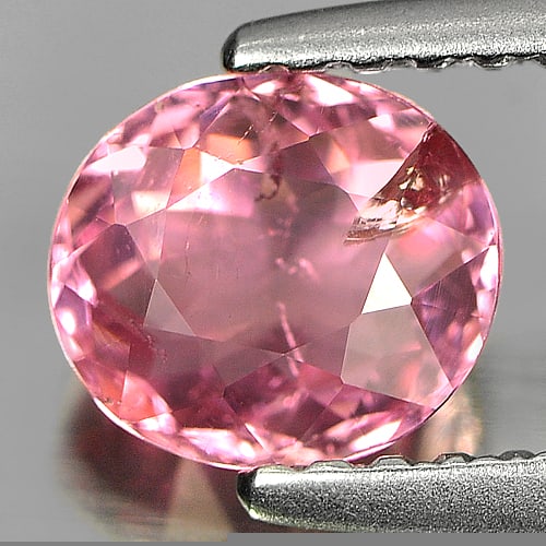 Natural Pink Tourmaline 0.77 Ct. Oval Shape 6.3 x 5.5 Mm Gemstone From Nigeria: Product ID: 807226570 Product Name: Natural Tourmaline Weight: 0.77 CT. Size: 6.3 x 5.5 x 3.8 MM. Shape: Oval Color: Pink Clarity:SI Luster: Good Gems Origin: Nigeria Treatment: Unheated Crystal Struc