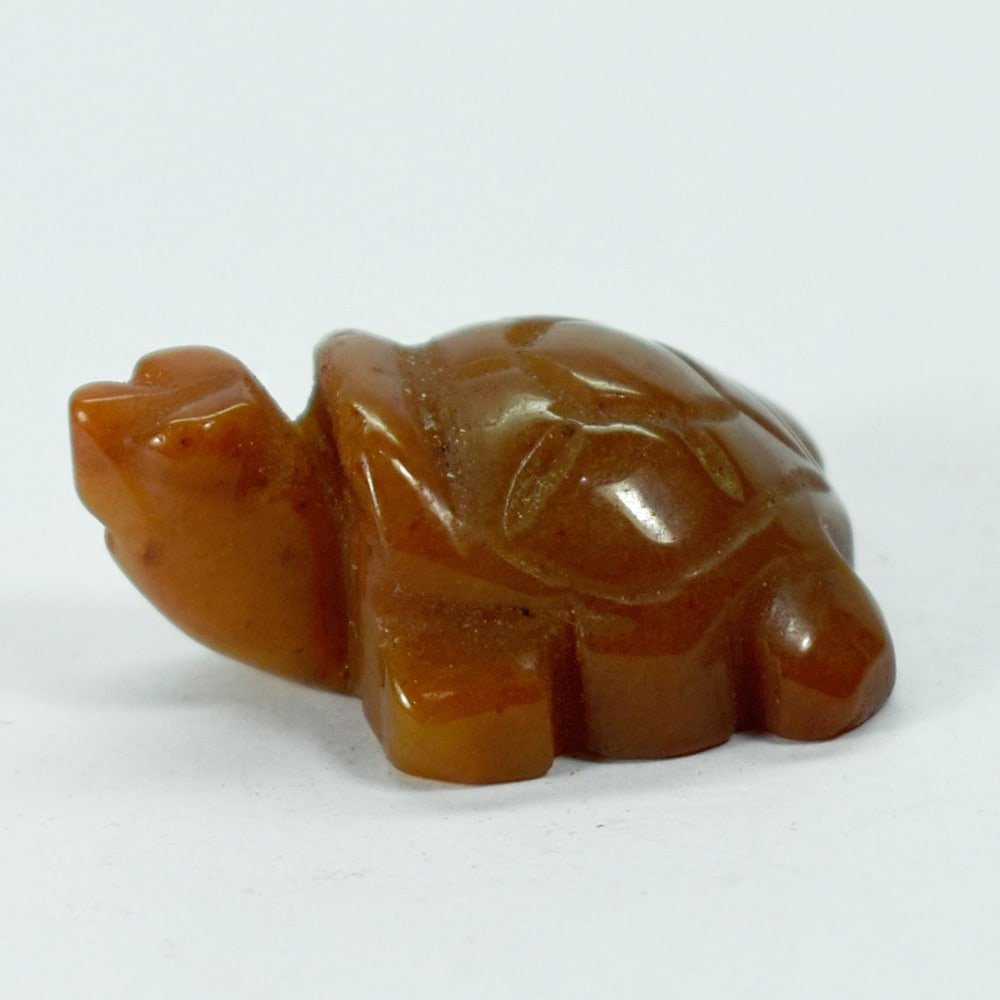 Natural Genuine Burmese Jade 108.55 Ct. Turtle Carving Shape: Product ID: 818102413 Product Name: Natural Gemstones Weight: 108.55 CT. Size: 27 x 37 x 28 MM. Shape: Caving Color: multi Color brown Honey Clarity:Opaque Luster: Good Gems Origin: Burma Treatment: U