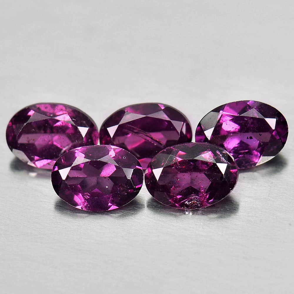 Natural Purplish Pink Rhodolite Garnet 4.60 Ct. 5 Pcs Oval Shape 6.9 x 5 Mm Gemstone From Madagascar: Product ID: 802926276 Product Name: Natural Rhodolite Weight: 4.60 CT. Size: 6.9 x 5 x 3.4 MM. Shape: Oval Color: Purplish Pink Clarity:VSI - SI Luster: Good Gems Origin: Madagascar Treatment: Unheate