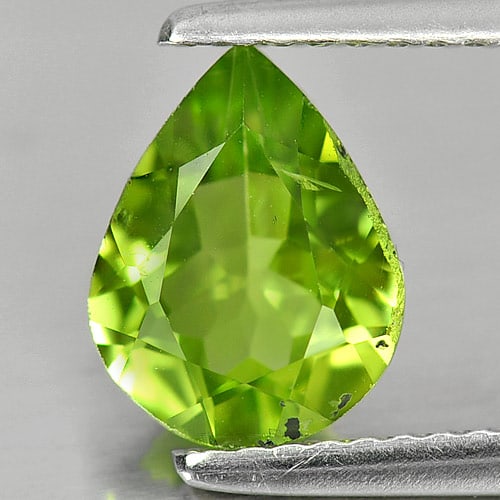 Natural Green Peridot 1.61 Ct. Pear Shape 9 x 7 Mm. Unheated Gemstone From Pakistan: Product ID: 805313447 Product Name: Natural Peridot Weight: 1.61 CT. Size: 9 x 7 x 4 MM. Shape: Pear Color: Green Clarity:SI1 Luster: Good Gems Origin: Pakistan Treatment: Unheated Crystal Structure: 