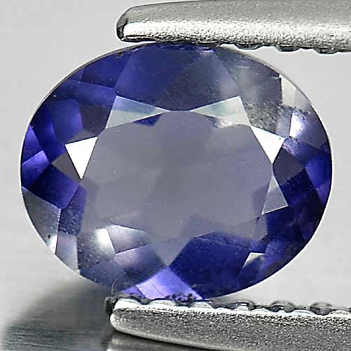 Natural Violet Blue Iolite 0.60 Ct. Oval Shape 6.8 x 5.7 Mm. Unheated Gemstone From Madagascar: Product ID: 803804463 Product Name: Natural Iolite Weight: 0.60 CT. Size: 6.8 x 5.7 x 3.2 MM. Shape: Oval Color: Violet Blue Clarity:VSI Luster: Good Gems Origin: Madagascar Treatment: Unheated Crysta