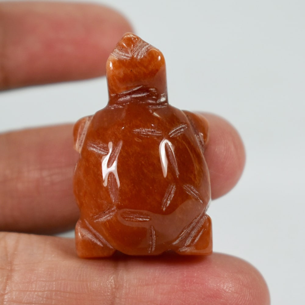 Natural Honey Jade 71.52 Ct. Turtle Carving Size 22 x 35 x 15 Mm. Gemstone From Burma: Product ID: 818102495 Product Name: Natural Gemstones Weight: 71.52 CT. Size: 22 x 35 x 15 MM. Shape: Caving Color: brown Honey Clarity:Opaque Luster: Good Gems Origin: Burma Treatment: Unheated Cryst
