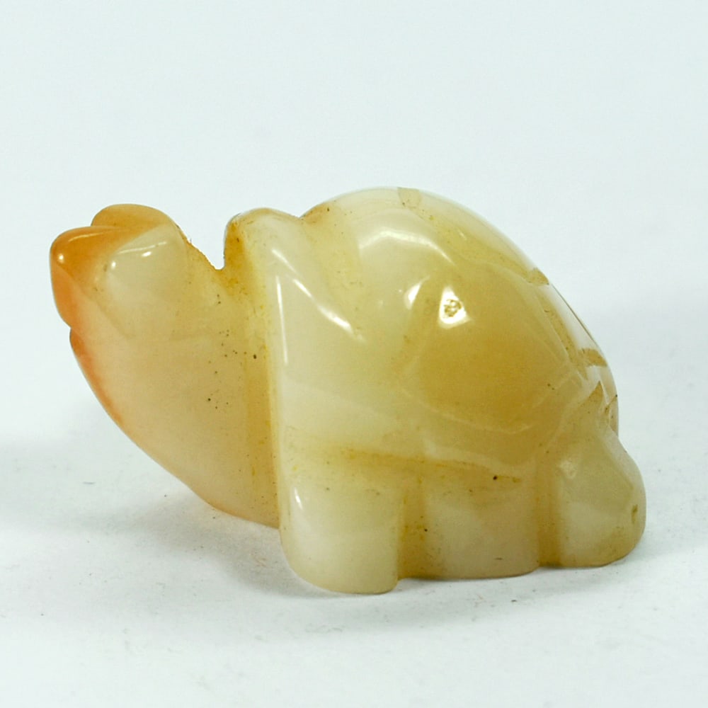 Natural Genuine Burmese Jade 126.45 Ct. Turtle Carving Shape: Product ID: 818102410 Product Name: Natural Gemstones Weight: 126.45 CT. Size: 28 x 38 x 20 MM. Shape: Caving Color: multi Color brown Honey Clarity:Opaque Luster: Good Gems Origin: Burma Treatment: U